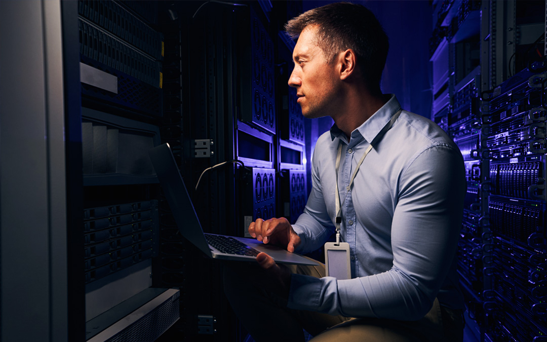 IT professional checking data center hardware equipment